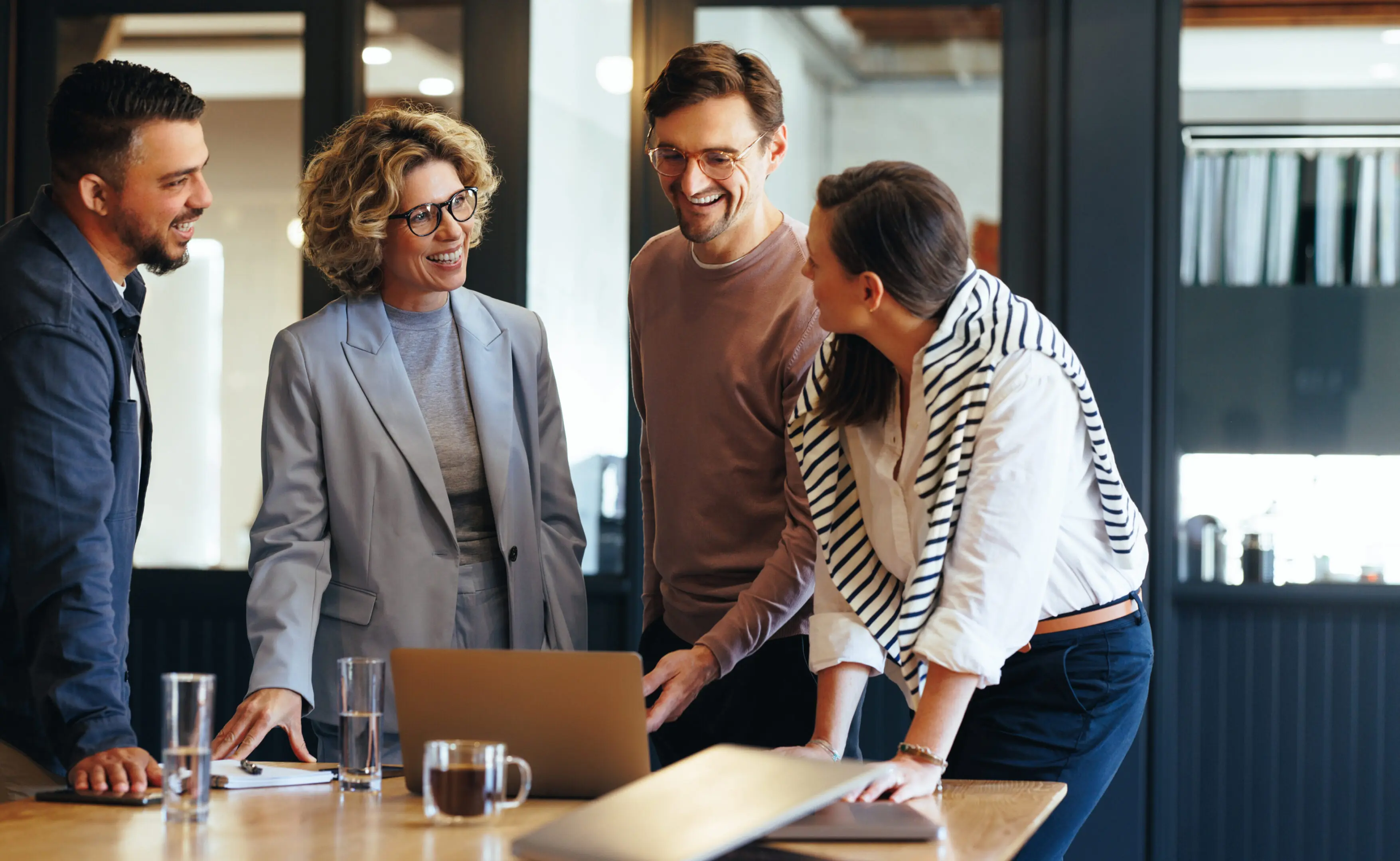 Business people having a meeting in a tech company Group of business people having a meeting in a tech company. Creative business professionals planning a project in an office. Teamwork and collaboration in a modern workplace.