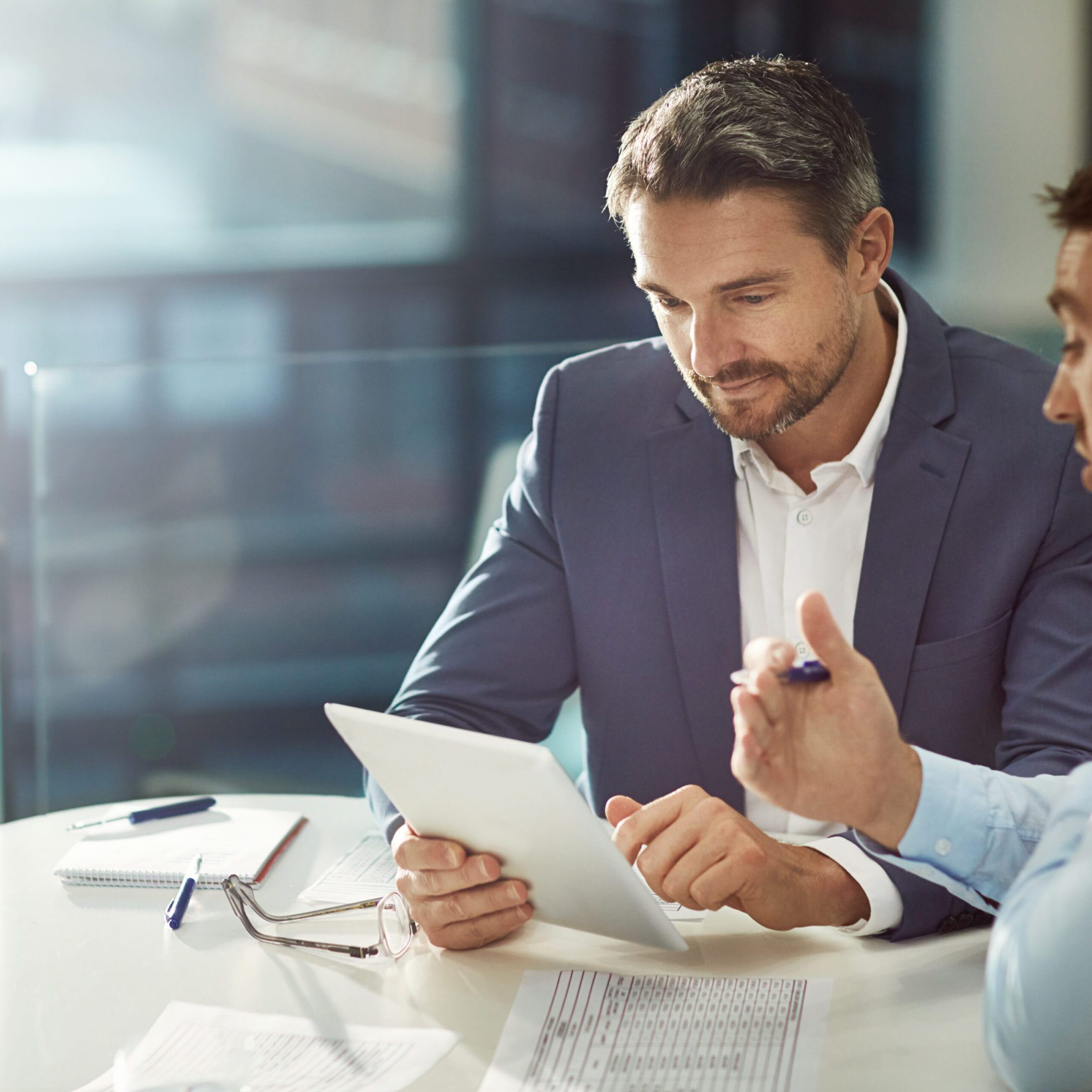 You've gotta see this Cropped shot of two businessmen meeting in the office